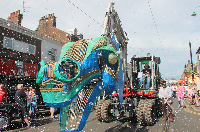 Sea monster head mounted on 8 ton excavator boom for Spare Parts Parade, Tram Sunday 2016